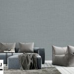 Empty wall in sophisticated living room interior with fabric sof