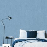 Navy,Blue,Carpet,In,Front,Of,Bed,Next,To,Lamp