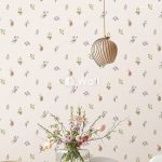 Different photos of a decorated white dining table in a bright environment with flowers and a flower vase